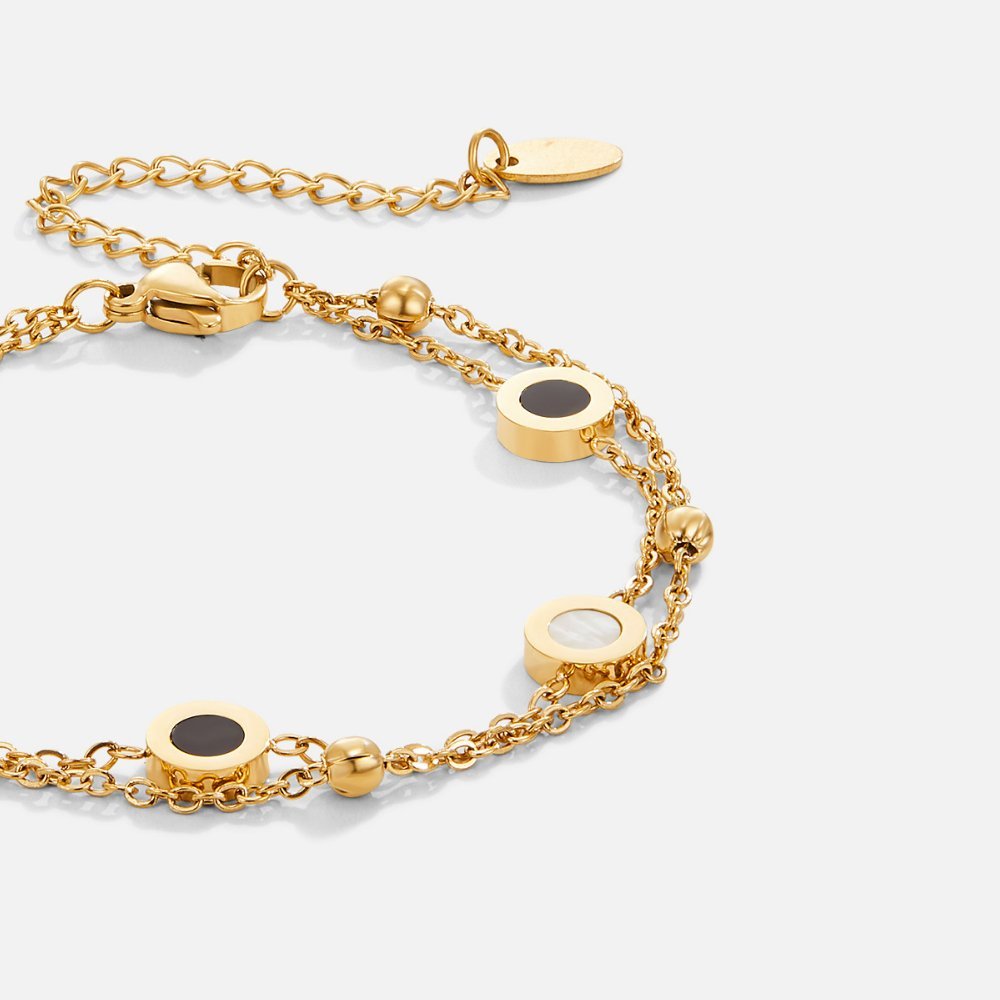 Armband úr ónyx og hvítum steinum